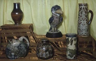 Pottery by the Martin brothers, grotesque bird at back typifies the Gothic side of their work by Martin Brothers Martin Brothers